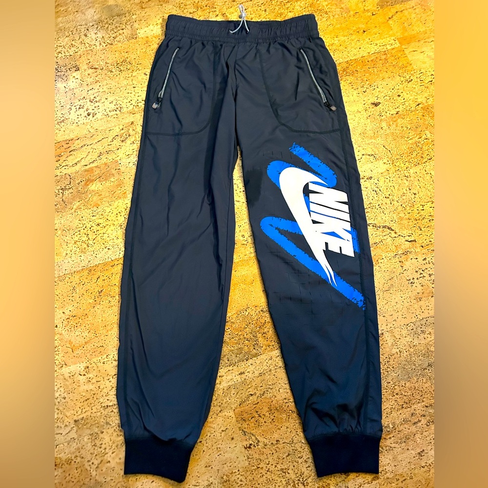 Nike Fem Vintage Windbreaker Joggers.
